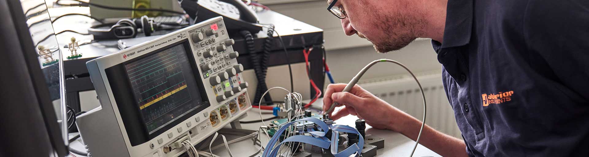Microscope technician tuning microscope components