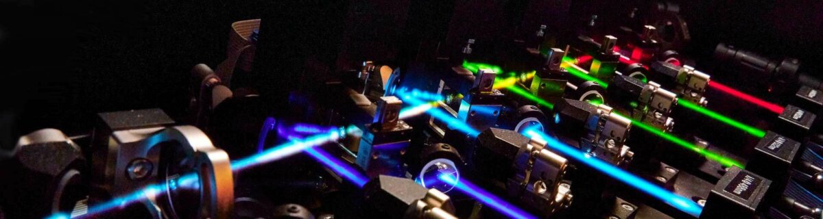 Colorful laser beams in the optical path of a microscope