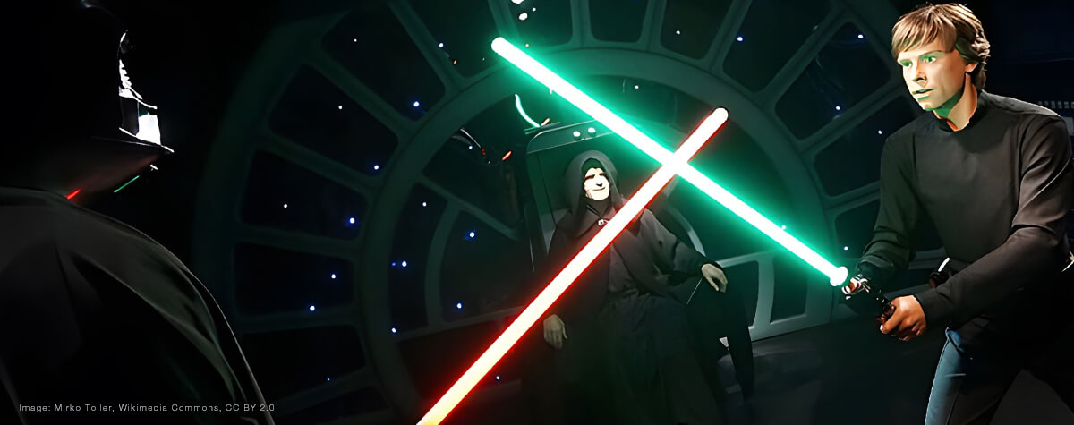 Darth Vader and Luke Skywalker crossing lightsabers
